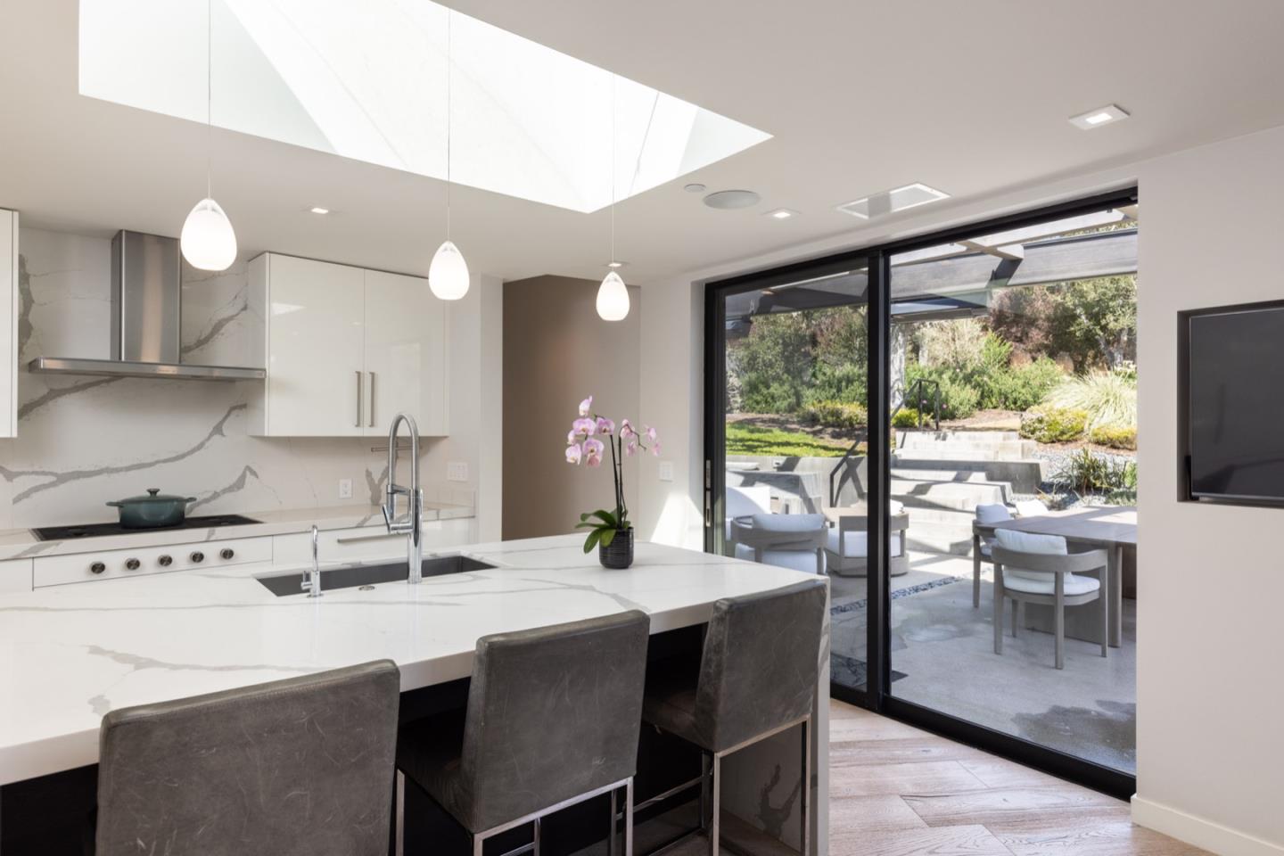 1505 Venadero Road Pebble Beach, CA 93953 - Photo 13 of 34 a very nice looking dining room with a large window and dining table