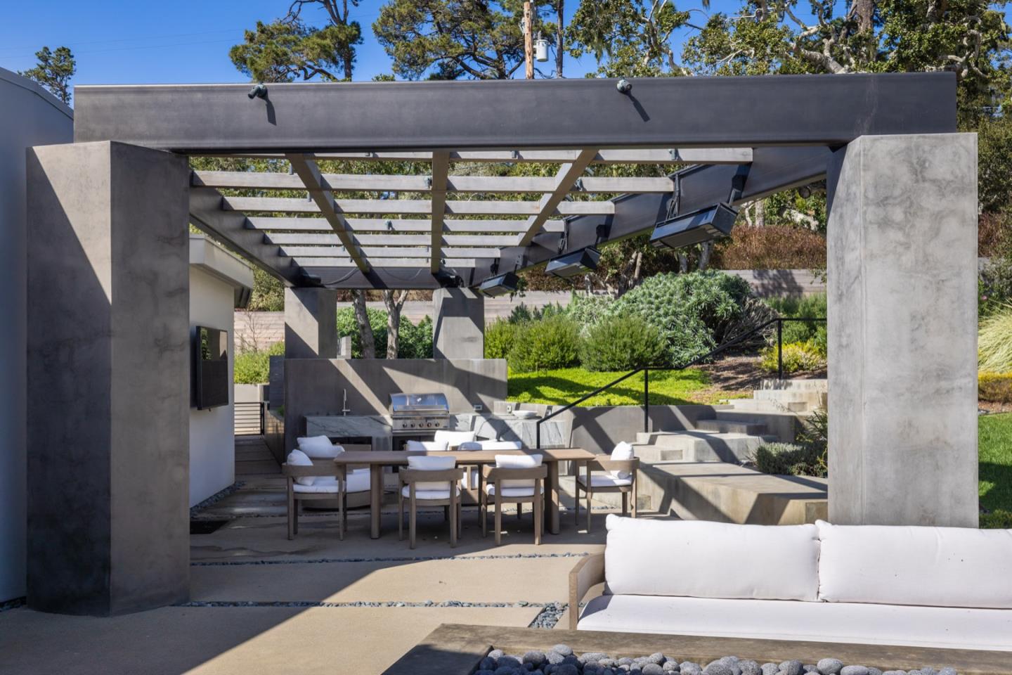 1505 Venadero Road Pebble Beach, CA 93953 - Photo 15 of 34 a view of a chairs and table in patio