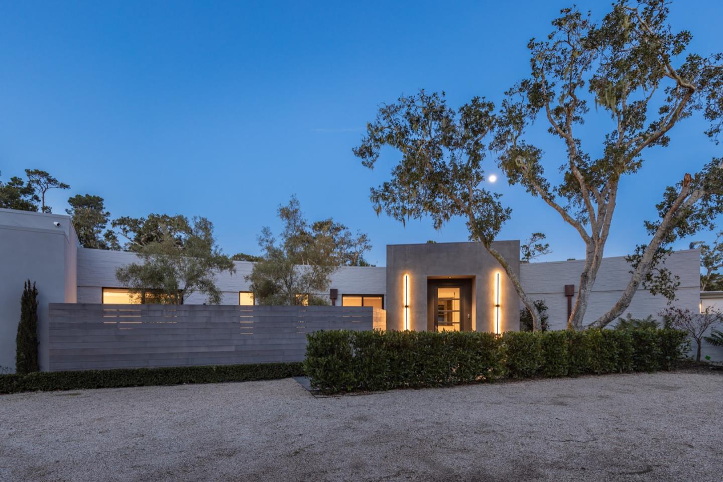 1505 Venadero Road Pebble Beach, CA 93953 - Photo 2 of 34 a front view of a house with a yard