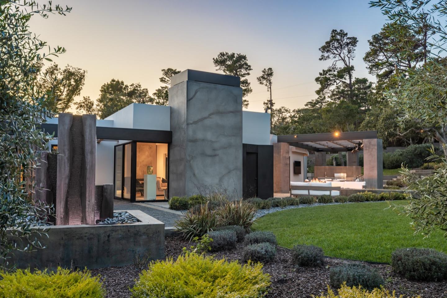 1505 Venadero Road Pebble Beach, CA 93953 - Photo 3 of 34 a front view of a house with garden