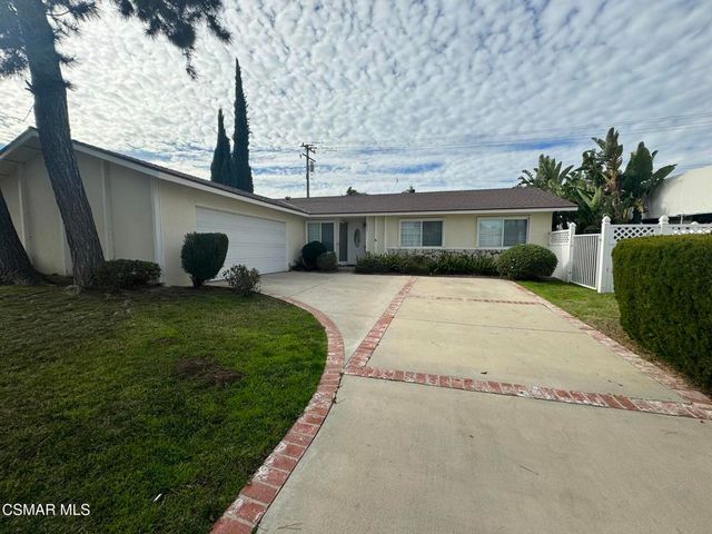 a view of a house with a patio
