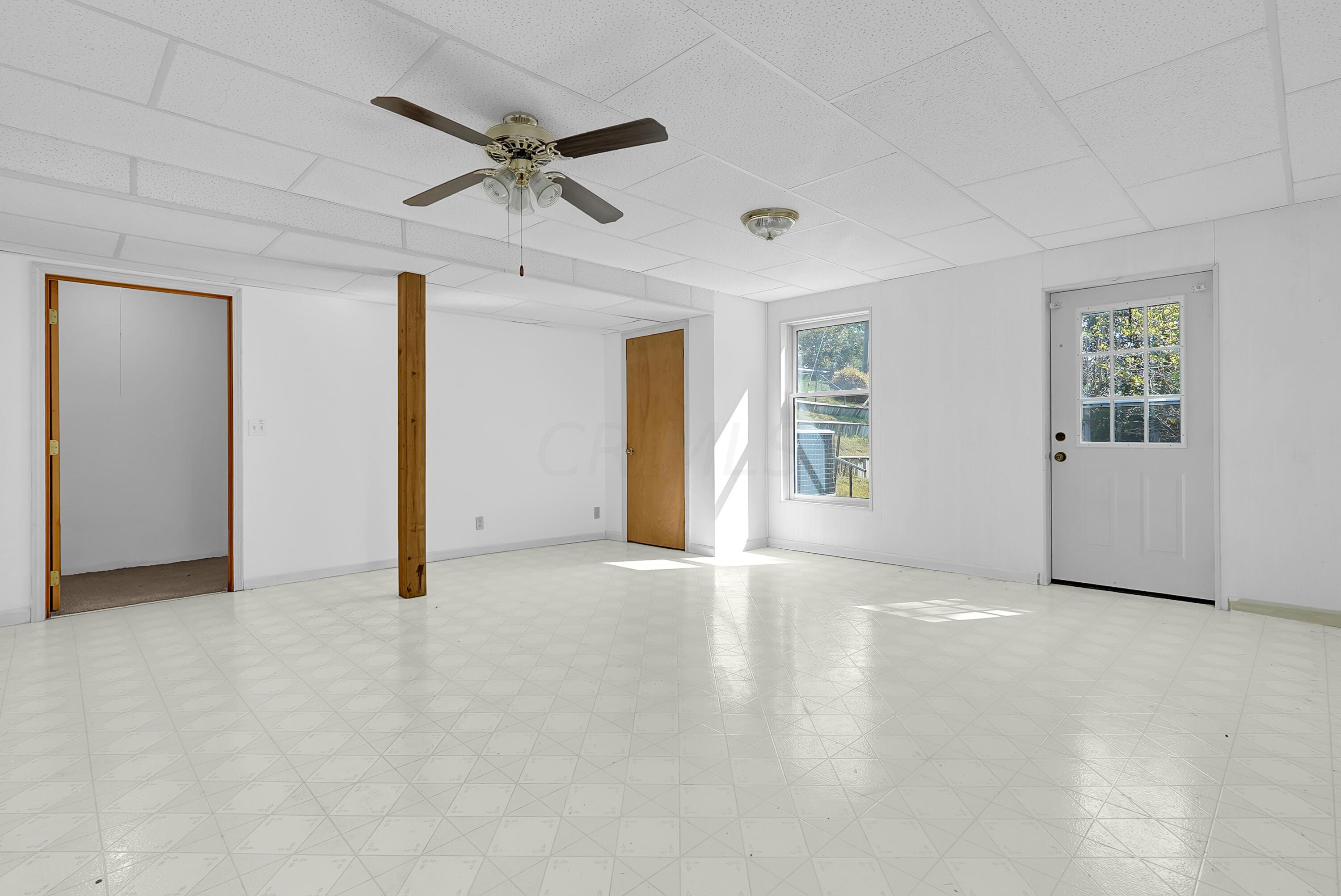 6865 Revenge Road Southwest Lancaster, OH 43130 - Photo 25 of 35 Finished room in basement with exit door and closet