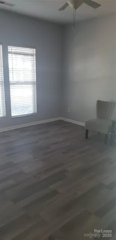 a kitchen with a refrigerator and a stove