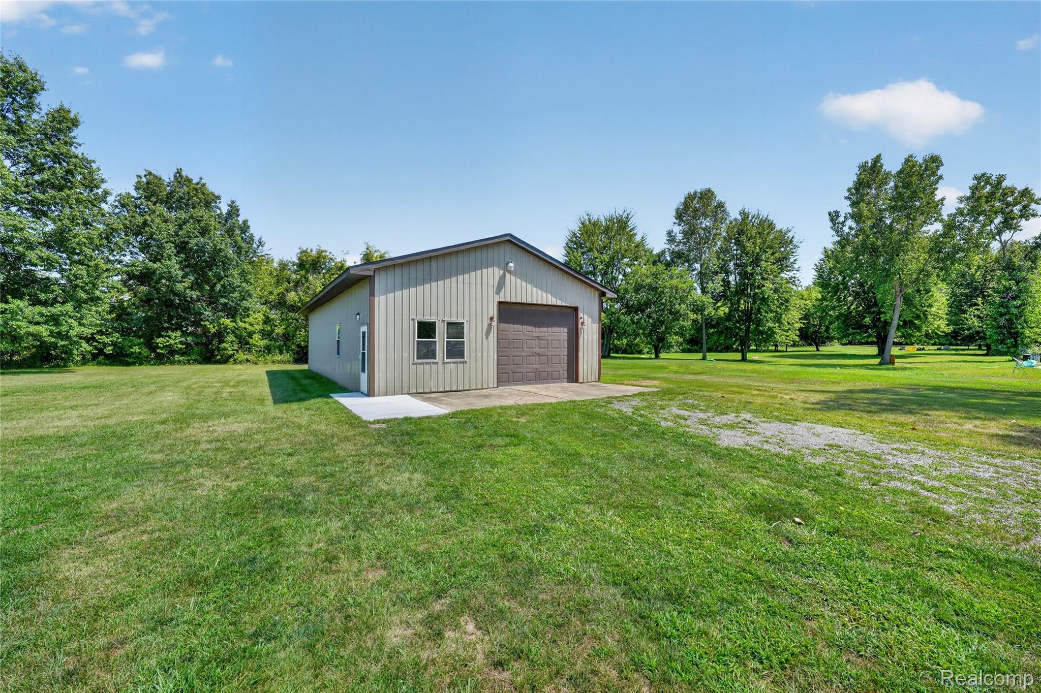 24775 Clark Road New Boston, MI 48164 - Photo 51 of 70 53-24775-Clark-Rd-New-Boston-WindowStill.jpg