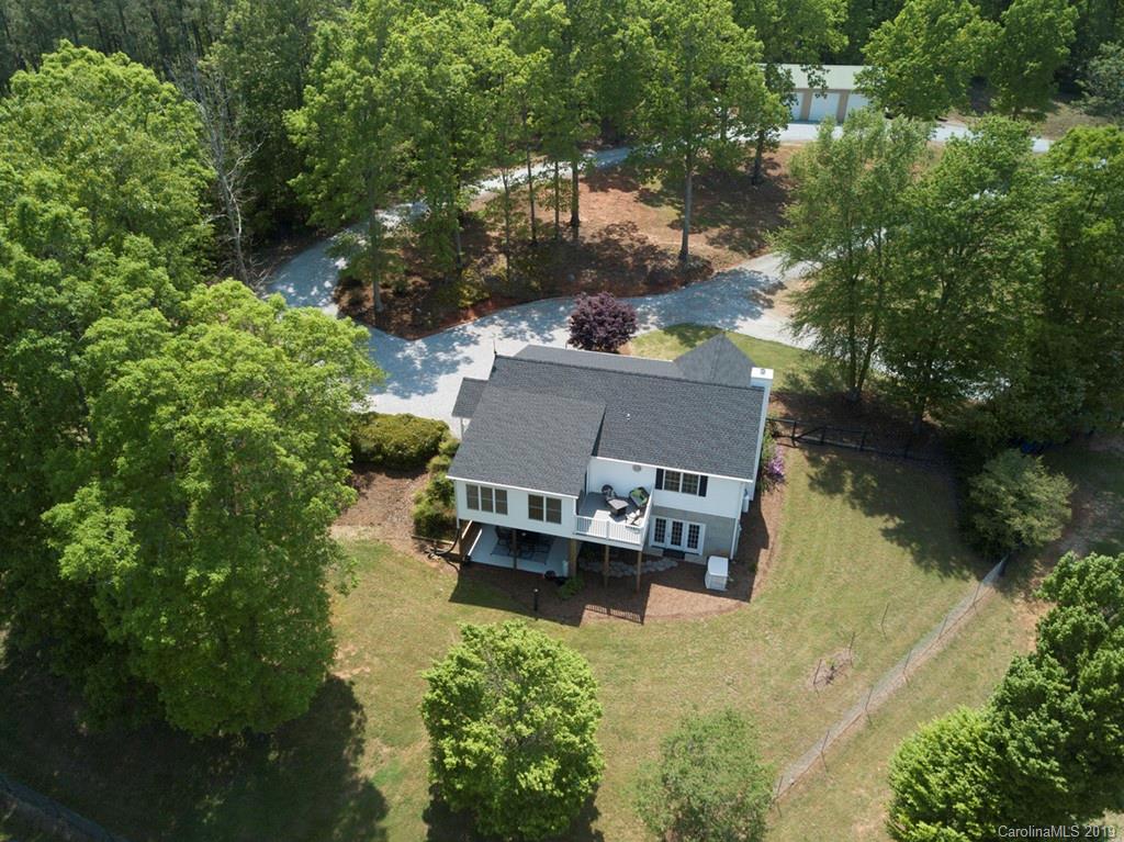 433 Meadow Crest Road Tryon, NC 28782 - Photo 2 of 29 an aerial view of house with yard swimming pool and outdoor seating