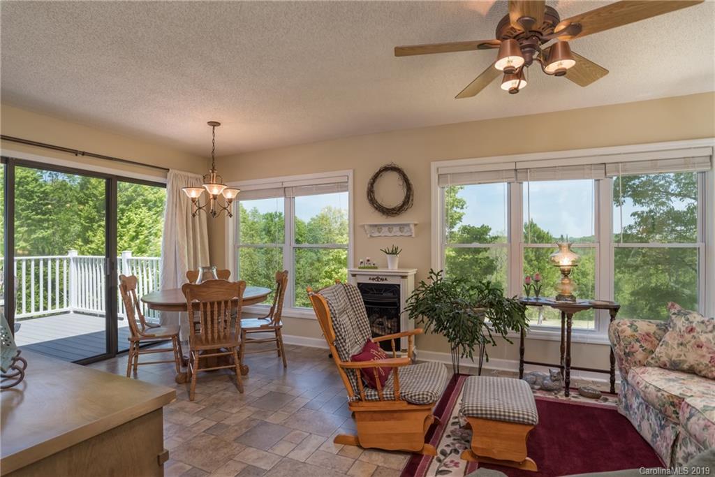 433 Meadow Crest Road Tryon, NC 28782 - Photo 15 of 29 a view of a livingroom with furniture window and outside view