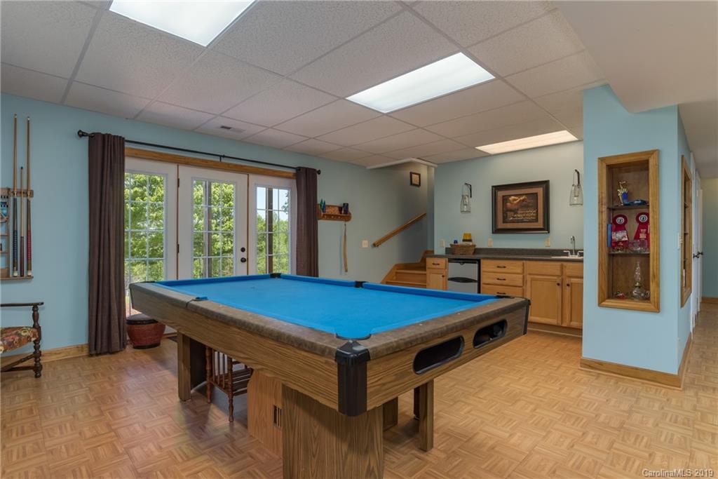 433 Meadow Crest Road Tryon, NC 28782 - Photo 22 of 29 a room with pool table and windows
