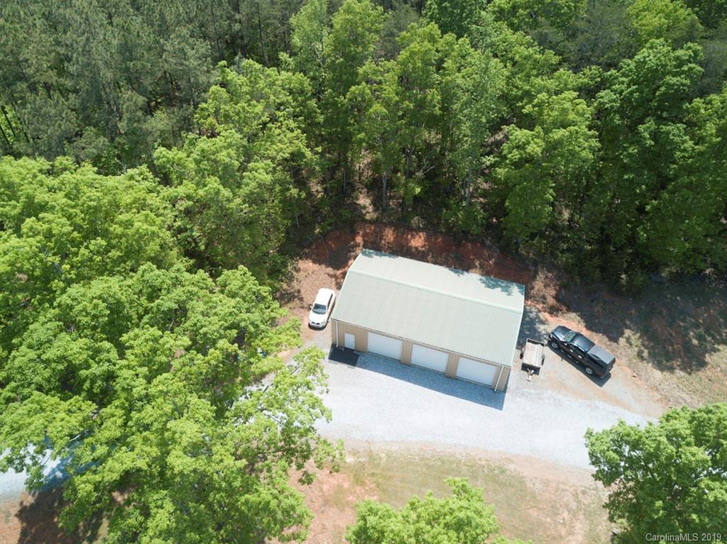 433 Meadow Crest Road Tryon, NC 28782 - Photo 28 of 29 an aerial view of a house with a yard basket ball court and outdoor seating