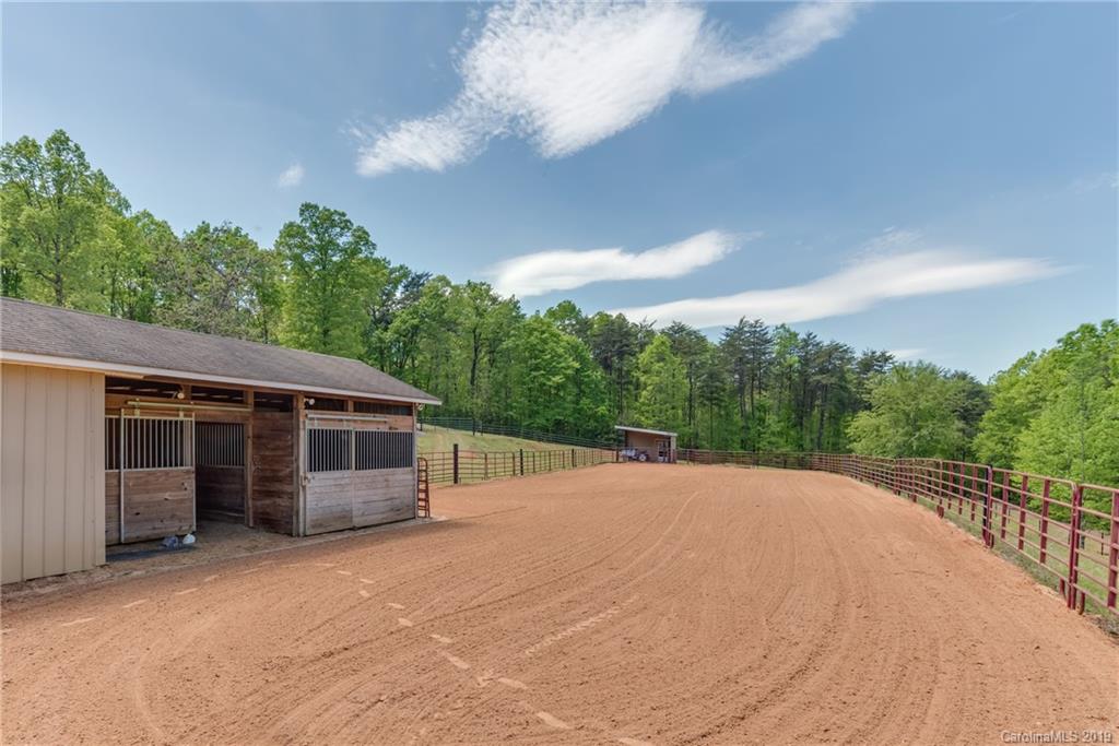 433 Meadow Crest Road Tryon, NC 28782 - Photo 8 of 29 a house with trees in the background