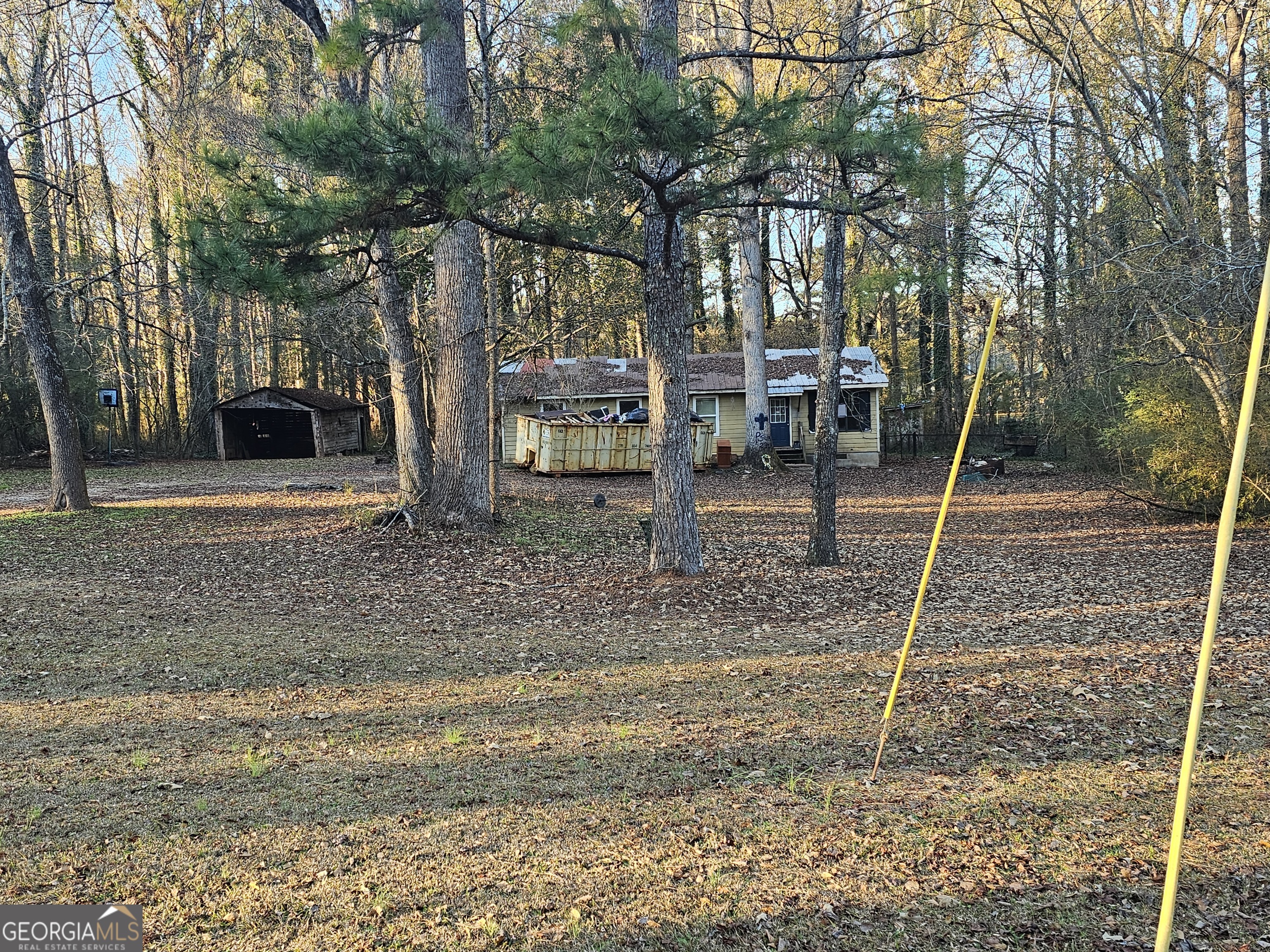 a backyard of a house with lots of green space