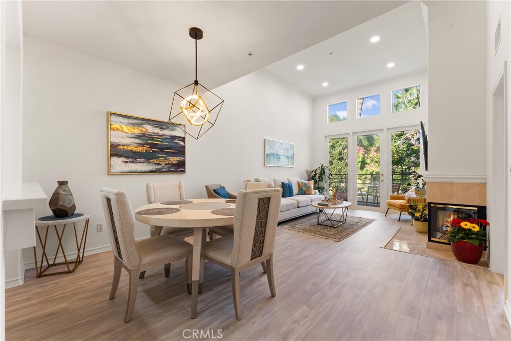 2243 Martin, Unit 415 Irvine, CA 92612 - Photo 21 of 34 a view of a dining room with furniture window and outside view