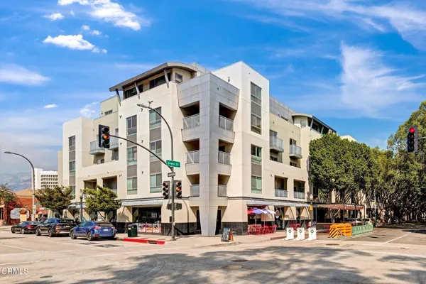 a front view of a building with street view