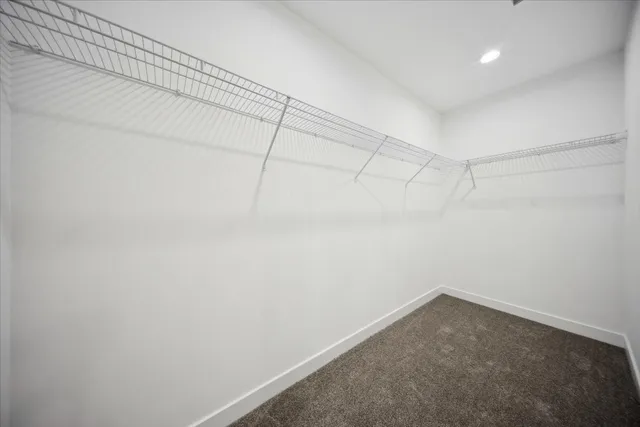 a view of a room with racks on the wall