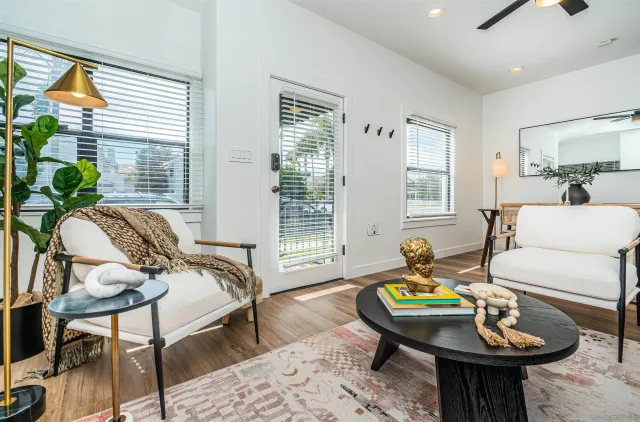 a kitchen with stainless steel appliances granite countertop a stove and a microwave