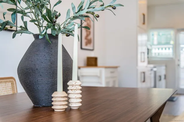 a bedroom with bed and wooden floor