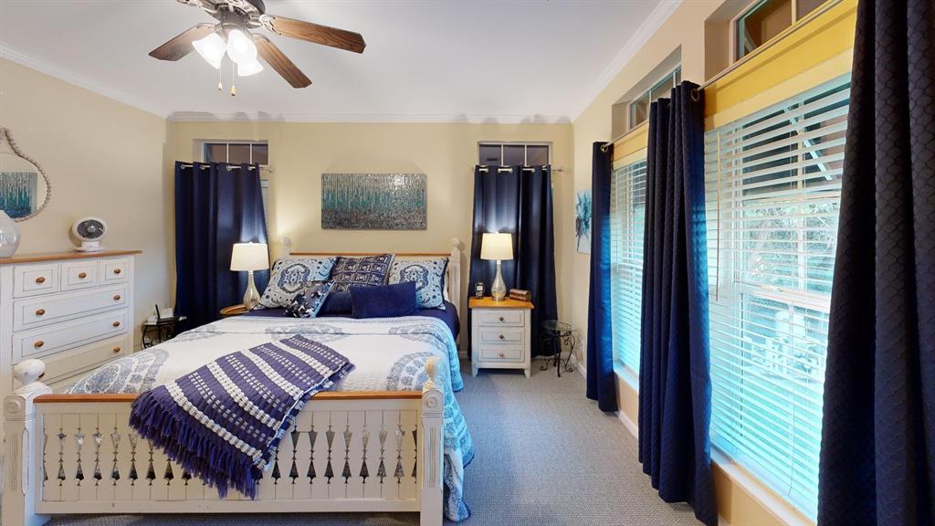 4925 Butler Lane Graham, TX 76450 - Photo 20 of 36 a bedroom with a bed and a window