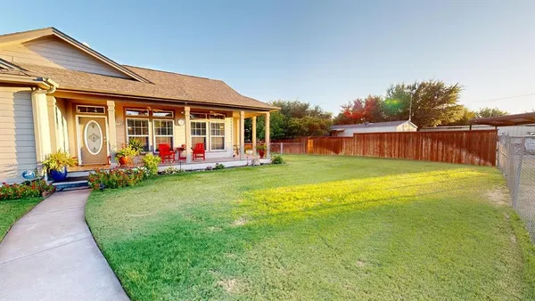 a house with trees in the background