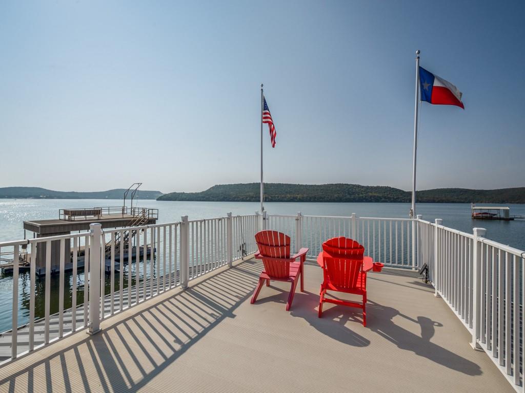 4925 Butler Lane Graham, TX 76450 - Photo 5 of 36 a two chairs sitting in the roof deck