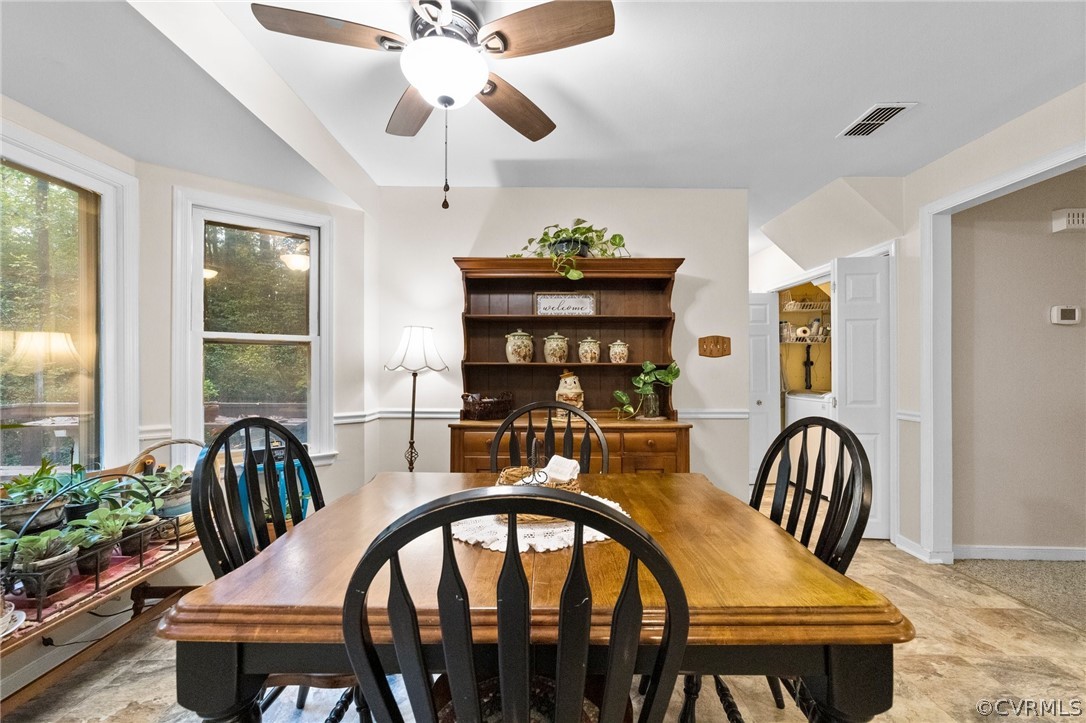 6810 Full Rack Circle Midlothian, VA 23112 - Photo 18 of 31 a view of a dining room with furniture and window
