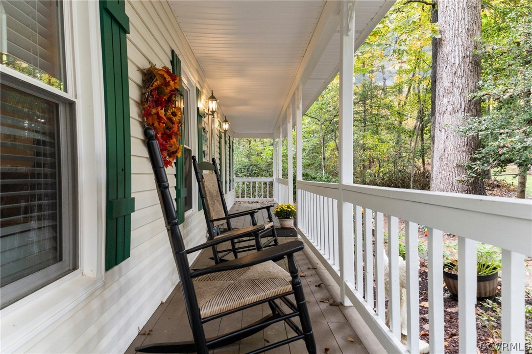 6810 Full Rack Circle Midlothian, VA 23112 - Photo 3 of 31 a view of a porch with furniture