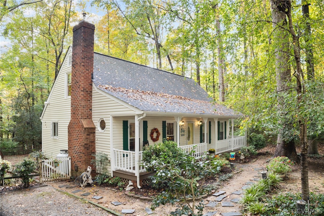 6810 Full Rack Circle Midlothian, VA 23112 - Photo 4 of 31 a view of a house with a yard and sitting area