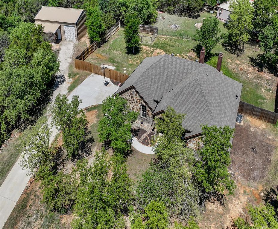 156 Cottongame Road Weatherford, TX 76088 - Photo 4 of 35 an aerial view of a house with outdoor space and street view