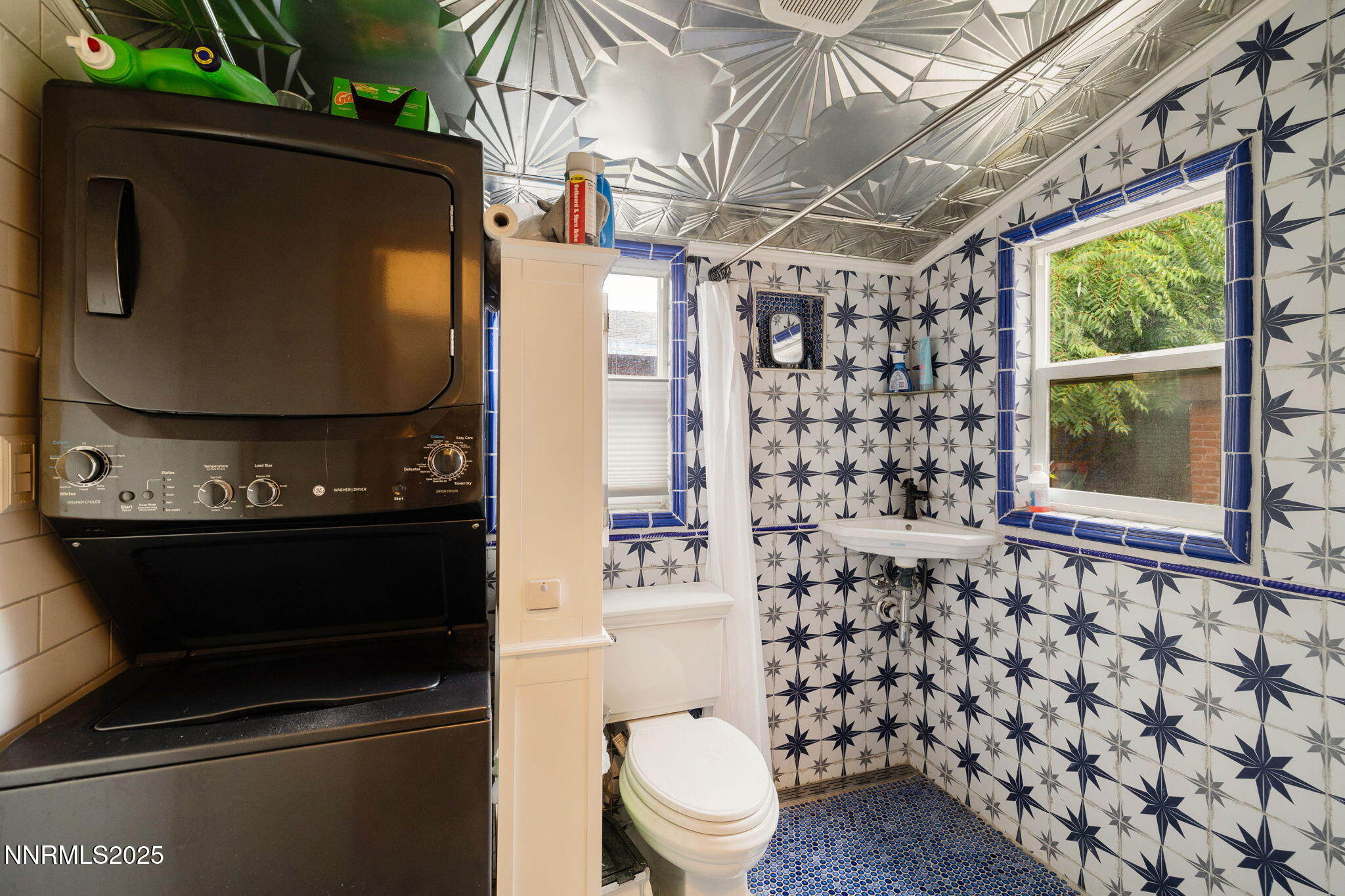 800 South Center Street Reno, NV 89501 - Photo 11 of 25 a bathroom with a toilet and a shower