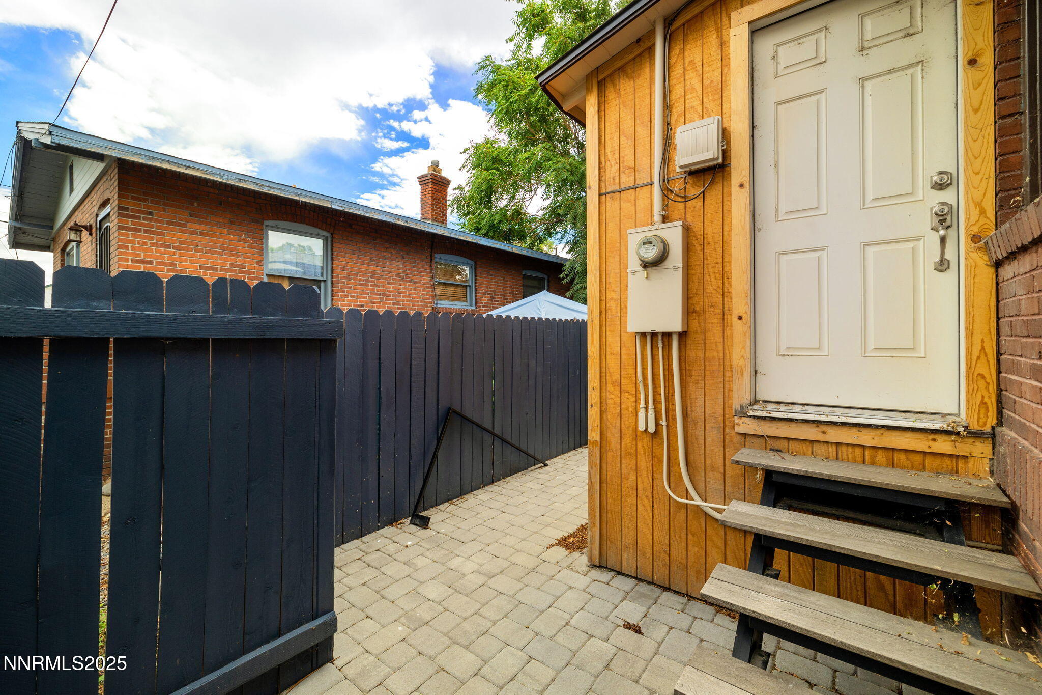 800 South Center Street Reno, NV 89501 - Photo 16 of 25 a front view of a house with a garden