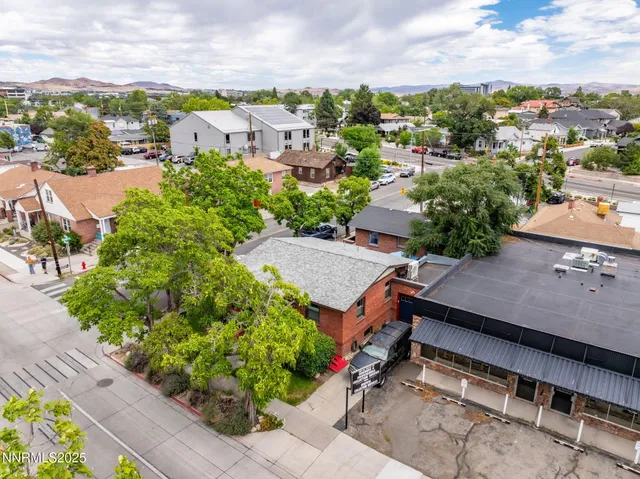 an aerial view of a house with a garden