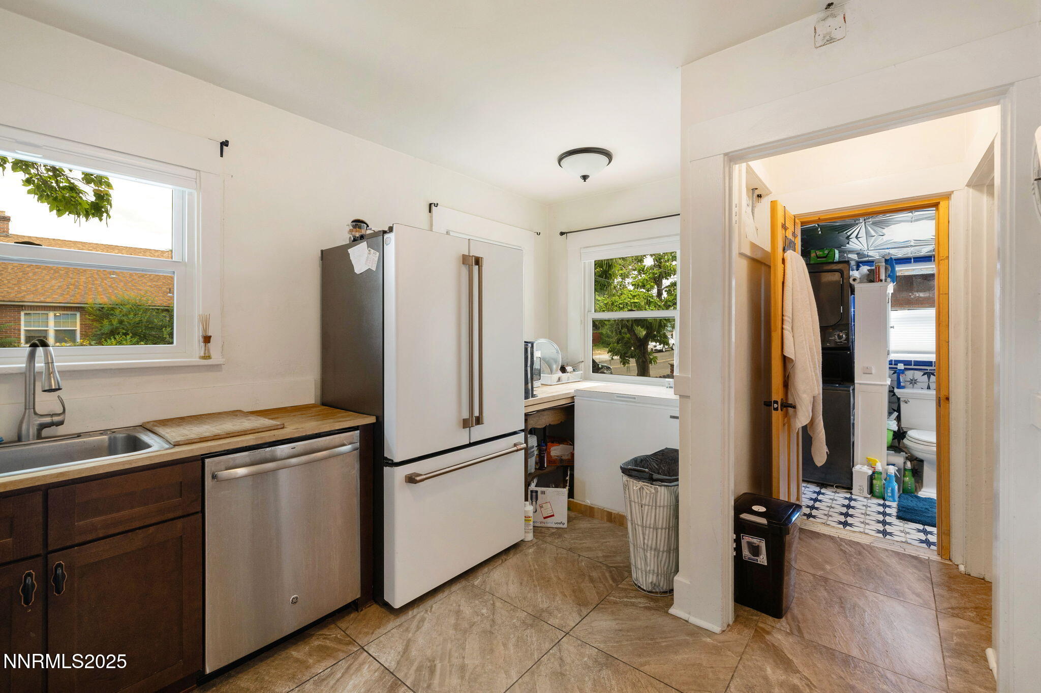 800 South Center Street Reno, NV 89501 - Photo 8 of 25 a kitchen with a refrigerator and a sink