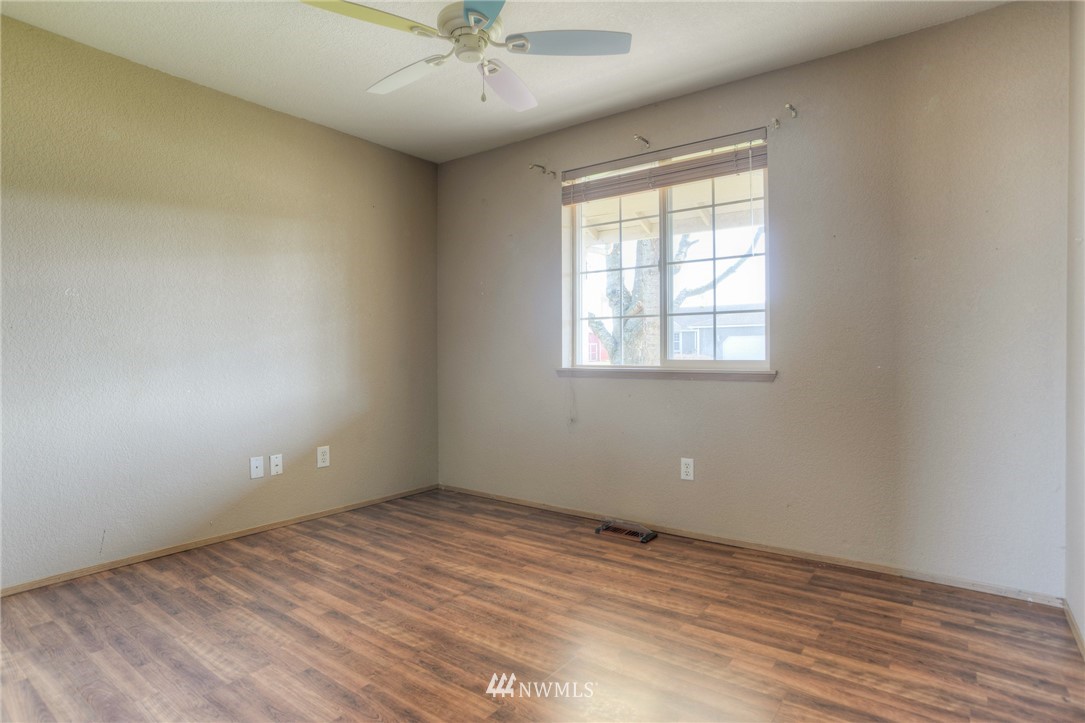 9320 181st Way Southwest Rochester, WA 98579 - Photo 15 of 21 an empty room with a window