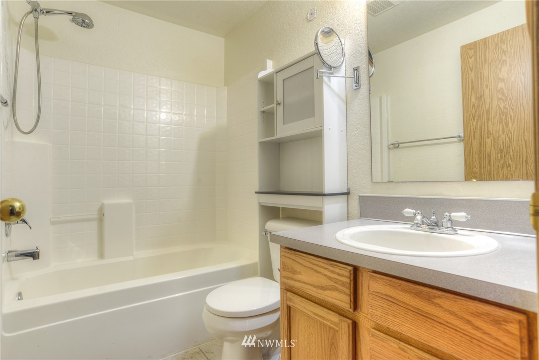 9320 181st Way Southwest Rochester, WA 98579 - Photo 16 of 21 a bathroom with a sink toilet and shower