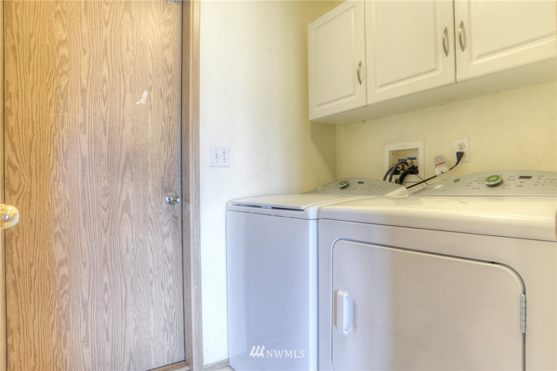 9320 181st Way Southwest Rochester, WA 98579 - Photo 18 of 21 a utility room with dryer and washer