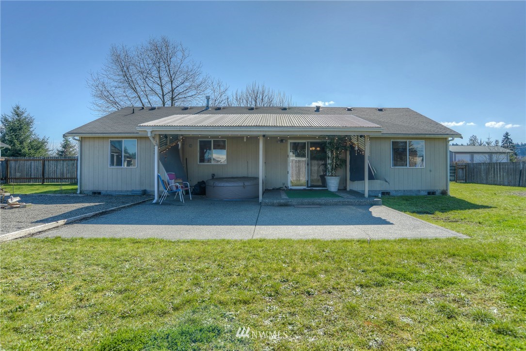 9320 181st Way Southwest Rochester, WA 98579 - Photo 19 of 21 a view of a house with a patio