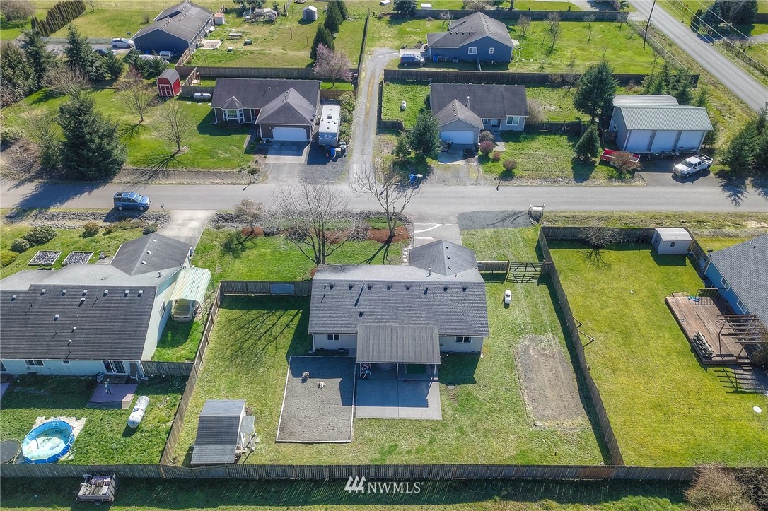 9320 181st Way Southwest Rochester, WA 98579 - Photo 3 of 21 an aerial view of a house with a garden