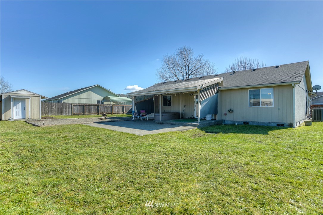 9320 181st Way Southwest Rochester, WA 98579 - Photo 21 of 21 a front view of a house with garden