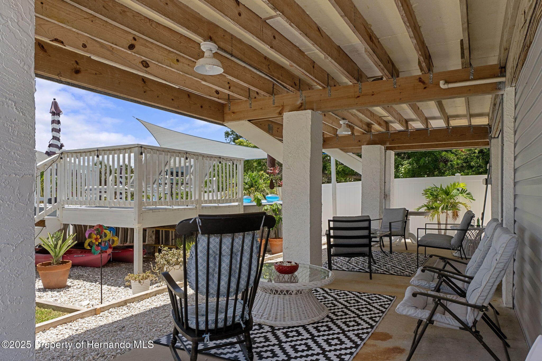 3216 Sea Grape Drive Hernando Beach, FL 34607 - Photo 30 of 39 Covered Back Porch
