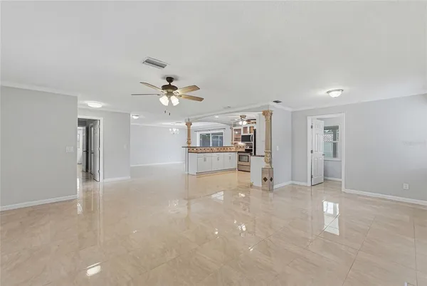 a view of a livingroom with a ceiling fan