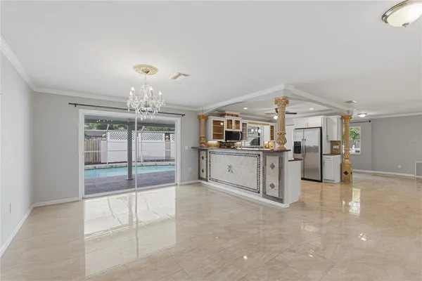 a view of a kitchen with a sink and cabinets