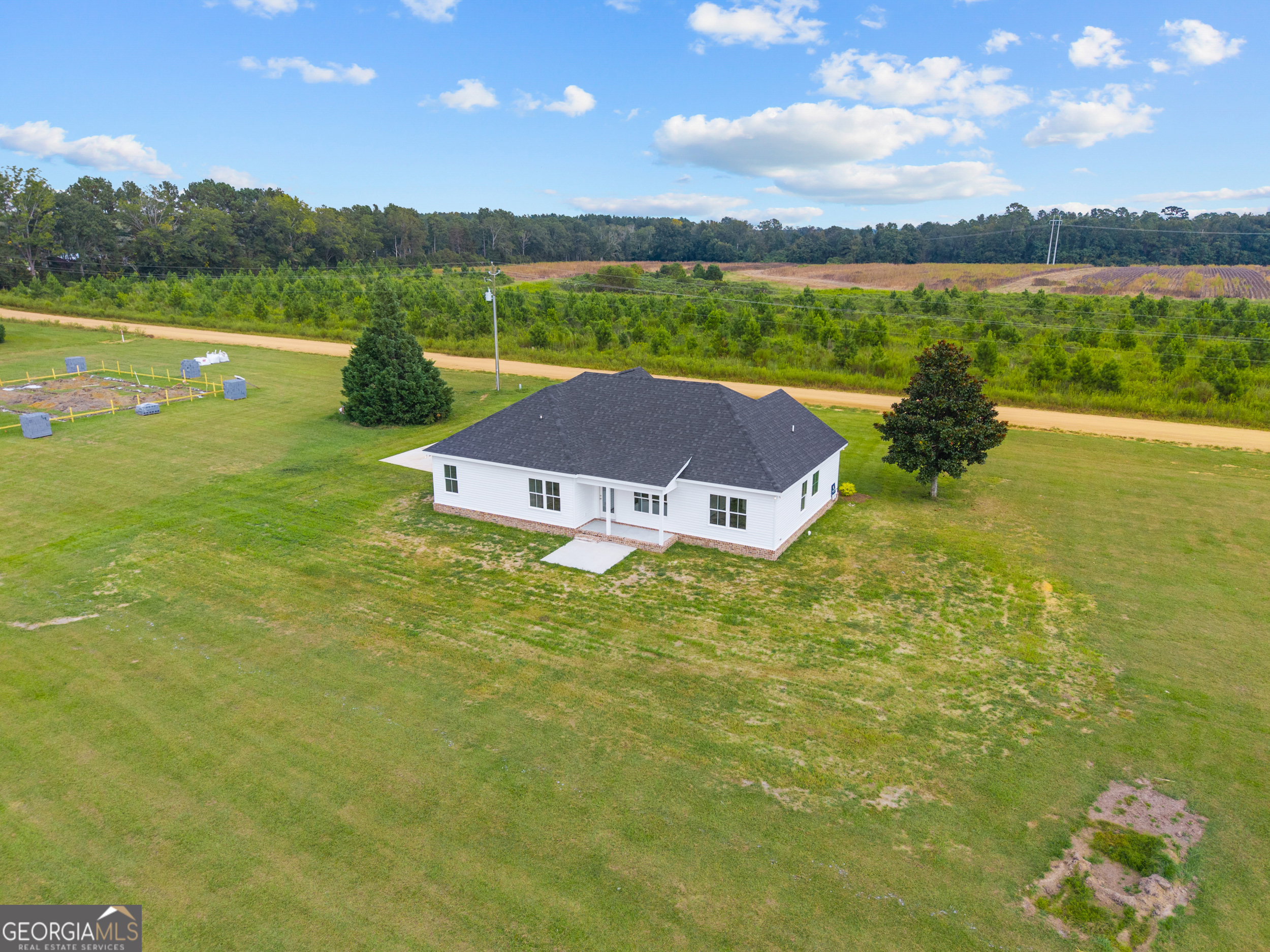 543 Jack Kennedy Road Statesboro, GA 30458 - Photo 24 of 35 a view of a lake with a yard