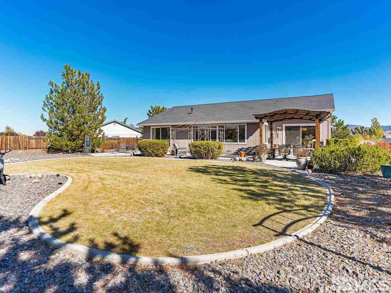 15523 Quicksilver Drive Reno, NV 89511 - Photo 23 of 25 a view of swimming pool with outdoor seating and deck