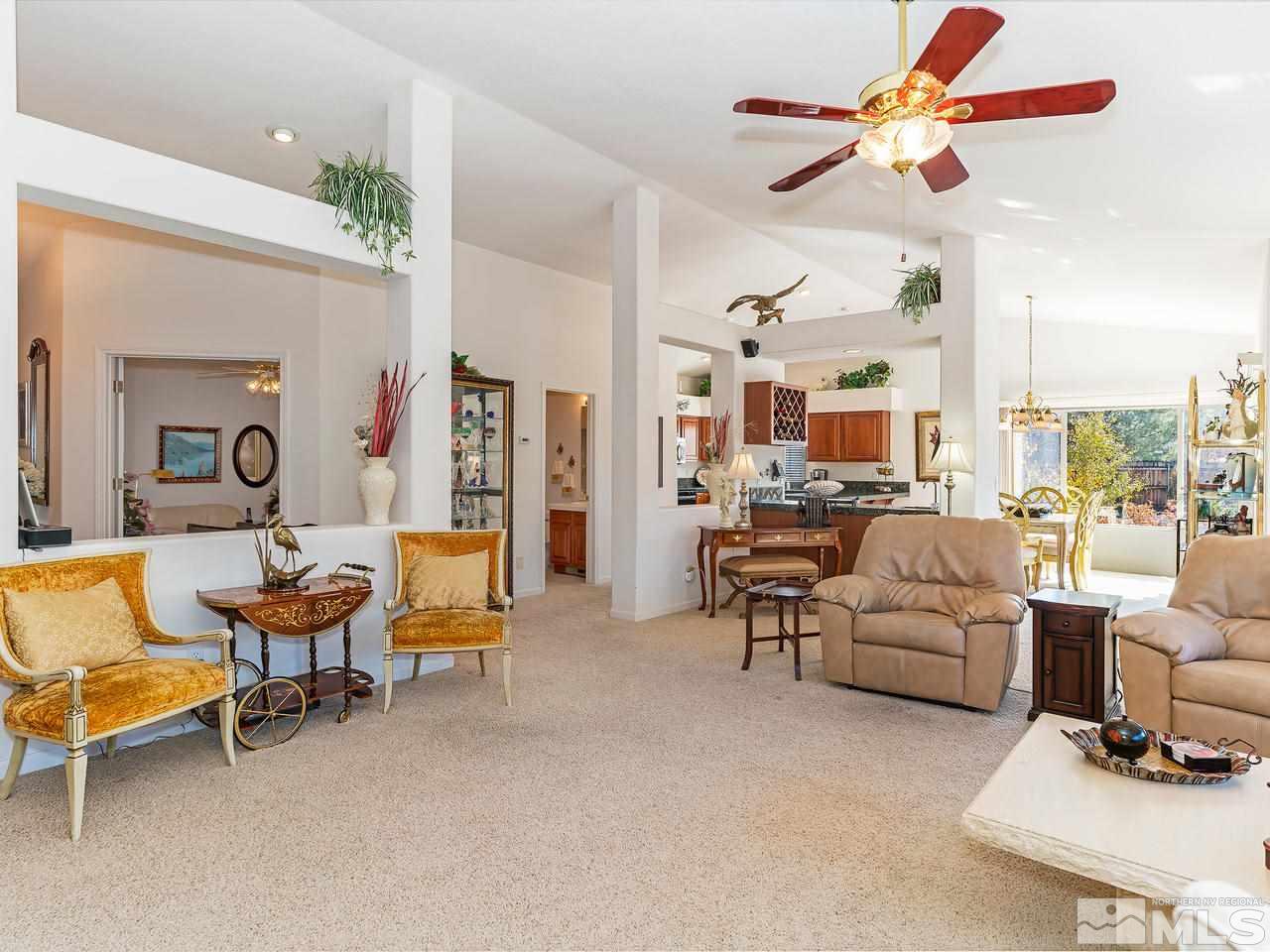15523 Quicksilver Drive Reno, NV 89511 - Photo 4 of 25 a living room with furniture and a large window