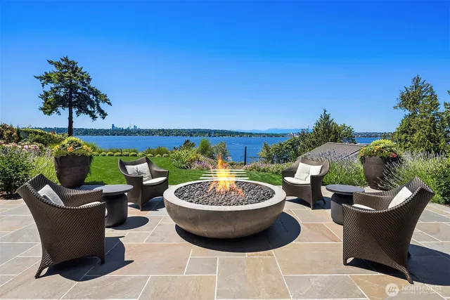 a view of a patio with couple of chairs