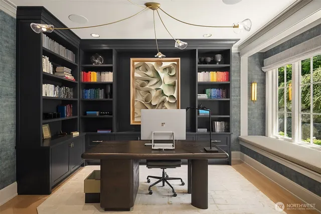 a view of dinning table and chairs in a room