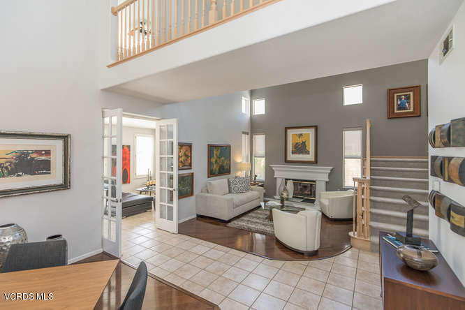 11218 Shadyridge Road Moorpark, CA 93021 - Photo 11 of 48 a living room with furniture and wooden floor
