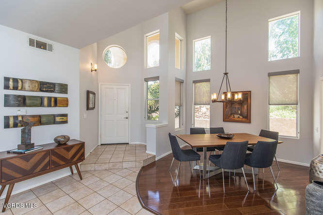 11218 Shadyridge Road Moorpark, CA 93021 - Photo 14 of 48 a view of a dining room with furniture and a large window