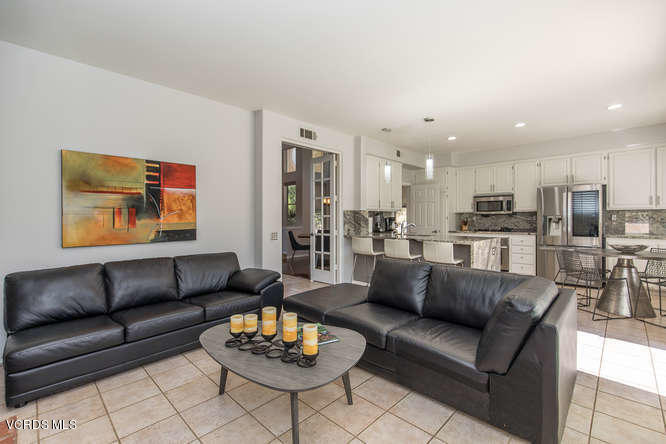 11218 Shadyridge Road Moorpark, CA 93021 - Photo 24 of 48 a view of a living room kitchen and a wooden floor