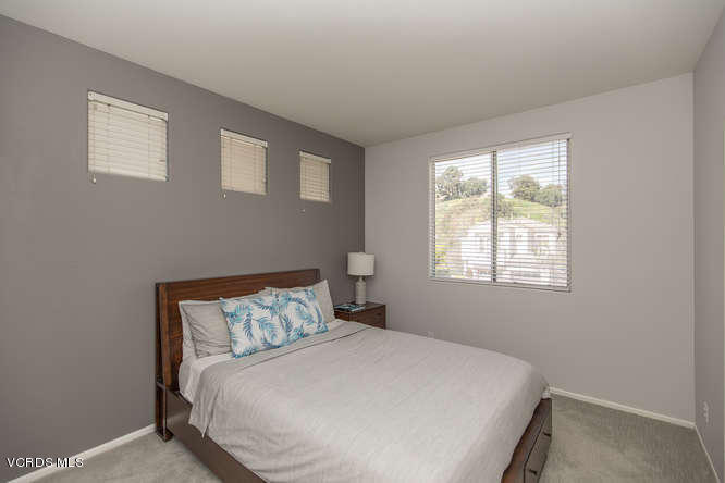 11218 Shadyridge Road Moorpark, CA 93021 - Photo 35 of 48 a bedroom with a bed and window
