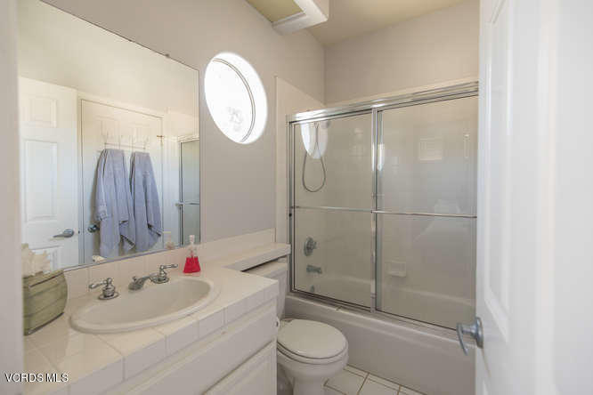 11218 Shadyridge Road Moorpark, CA 93021 - Photo 36 of 48 a bathroom with a sink toilet and shower
