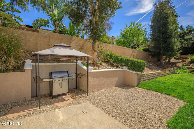 11218 Shadyridge Road Moorpark, CA 93021 - Photo 39 of 48 a patio with table and chairs